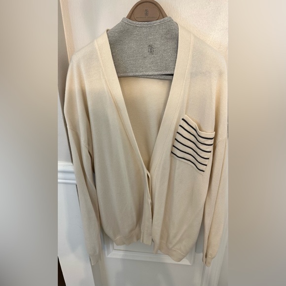 Brunello Cucinelli beige cardigan with monili on the left packet. 100% cashmere